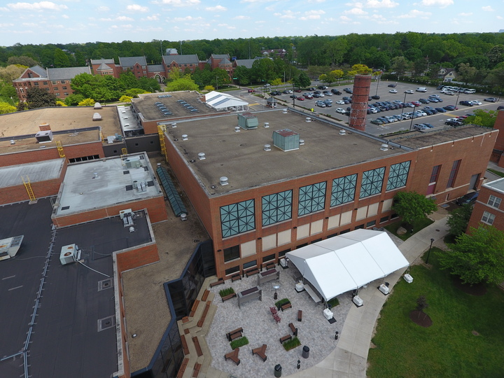 University courtyard tent installation for event