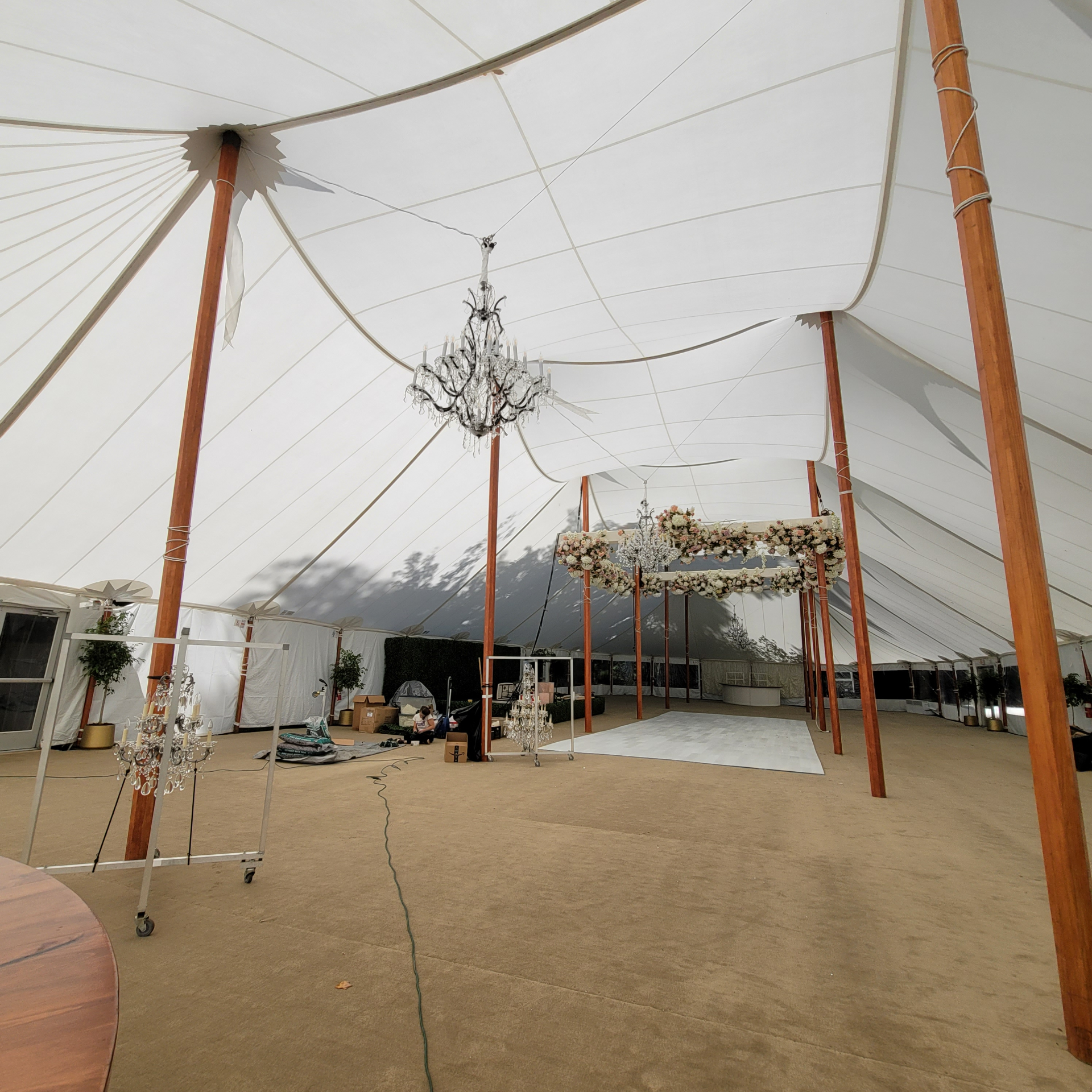 Elegant Wedding Setup with Crystal Chandeliers