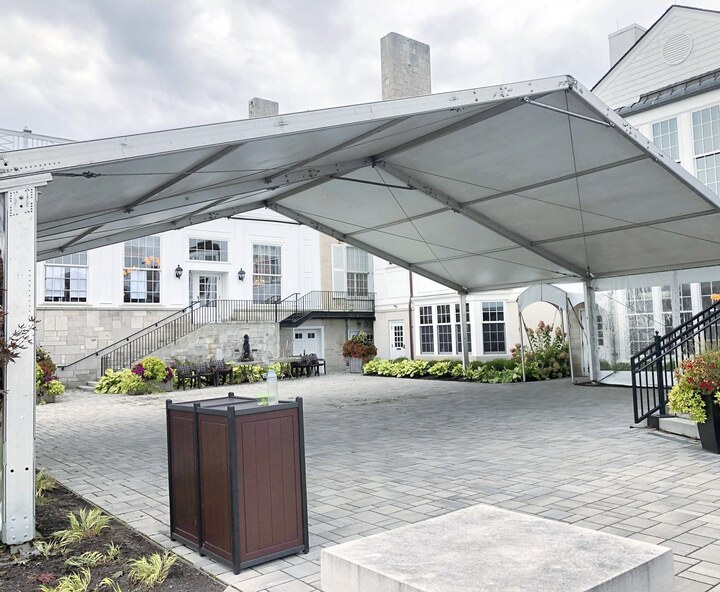 Elegant clear-span tent at corporate venue entrance