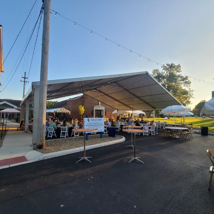 Aerial view of academic campus tent setup