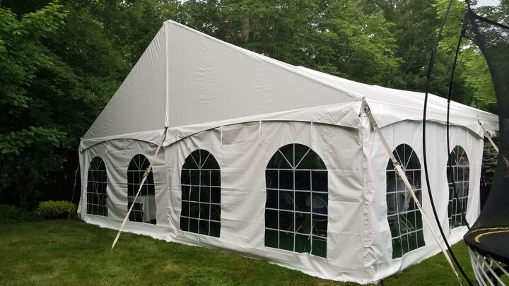 Frame tent with windows for backyard event