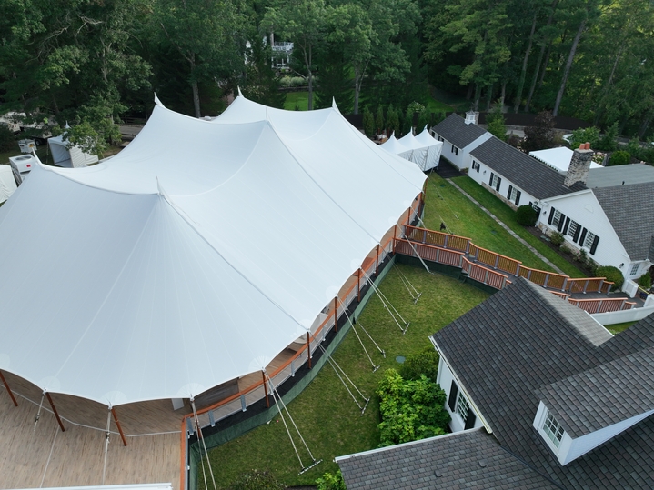 Aerial view of sailcloth wedding tent with raised deck