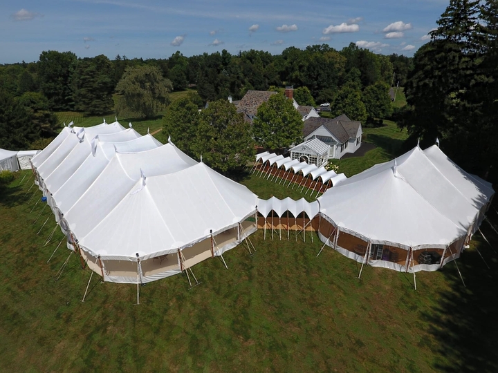 Aerial view of connected sailcloth tents for large wedding