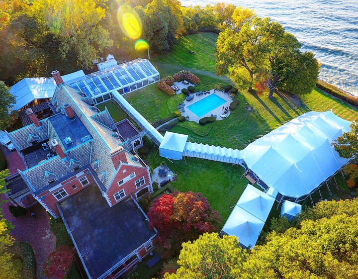 Waterfront estate wedding with clear-top and sailcloth tents